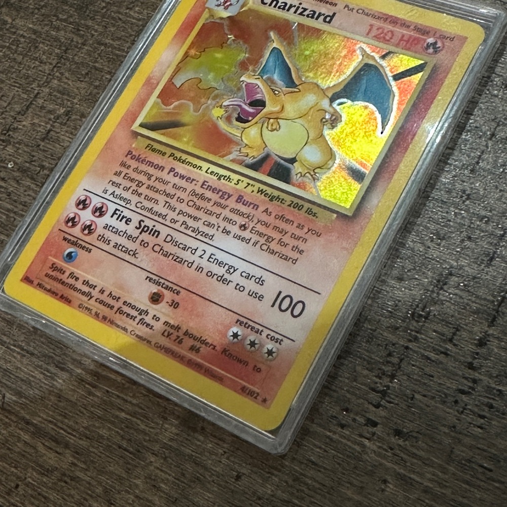 Pokémon cards Charizard and Mew